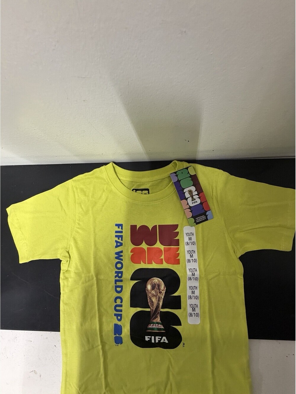 Official FIFA World Cup 2026 Yellow T-Shirt “We Are FIFA” Youth Size M (NEW)